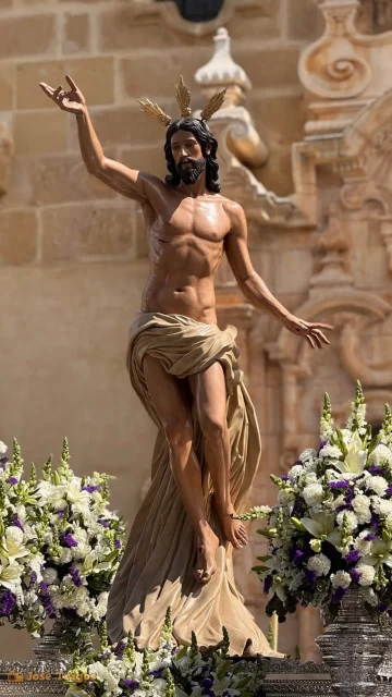 The Cristo Resucitado in front of the doorway of the church of Campillos